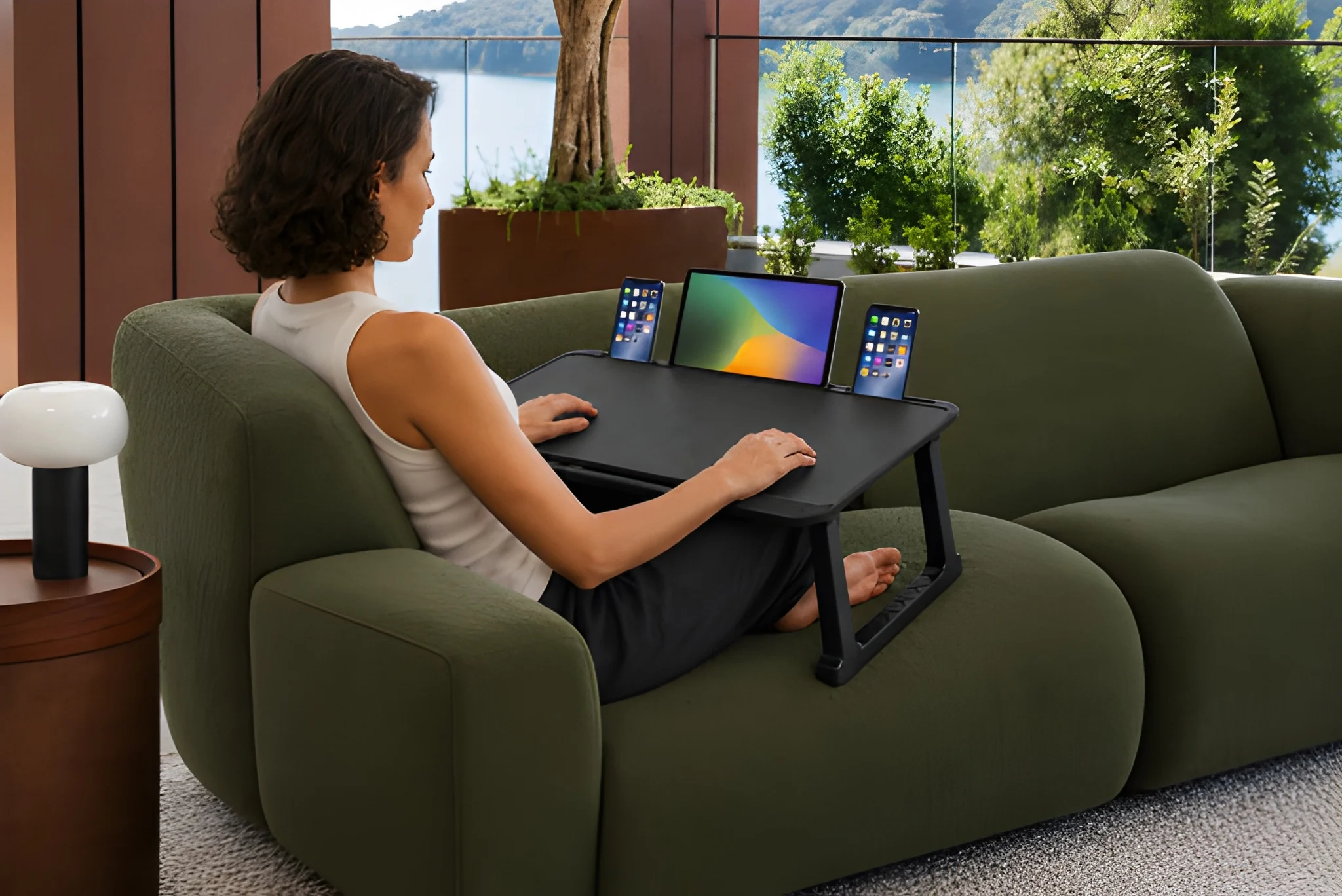 Adjustable lap desk in use on a sofa